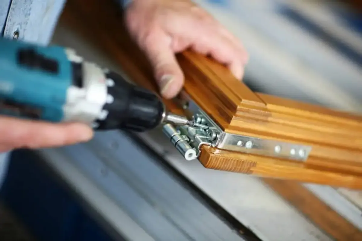 SDR London certified specialist performing a professional sliding door track and roller repair in a real London home